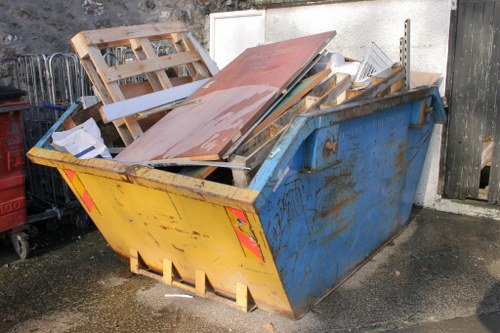 Investigator reviewing delivery logs and photographs of a skip site