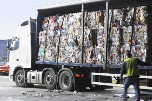 Different types of construction waste segregated for recycling