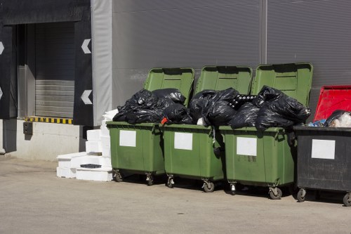 Professional waste management team assisting with grab hire services